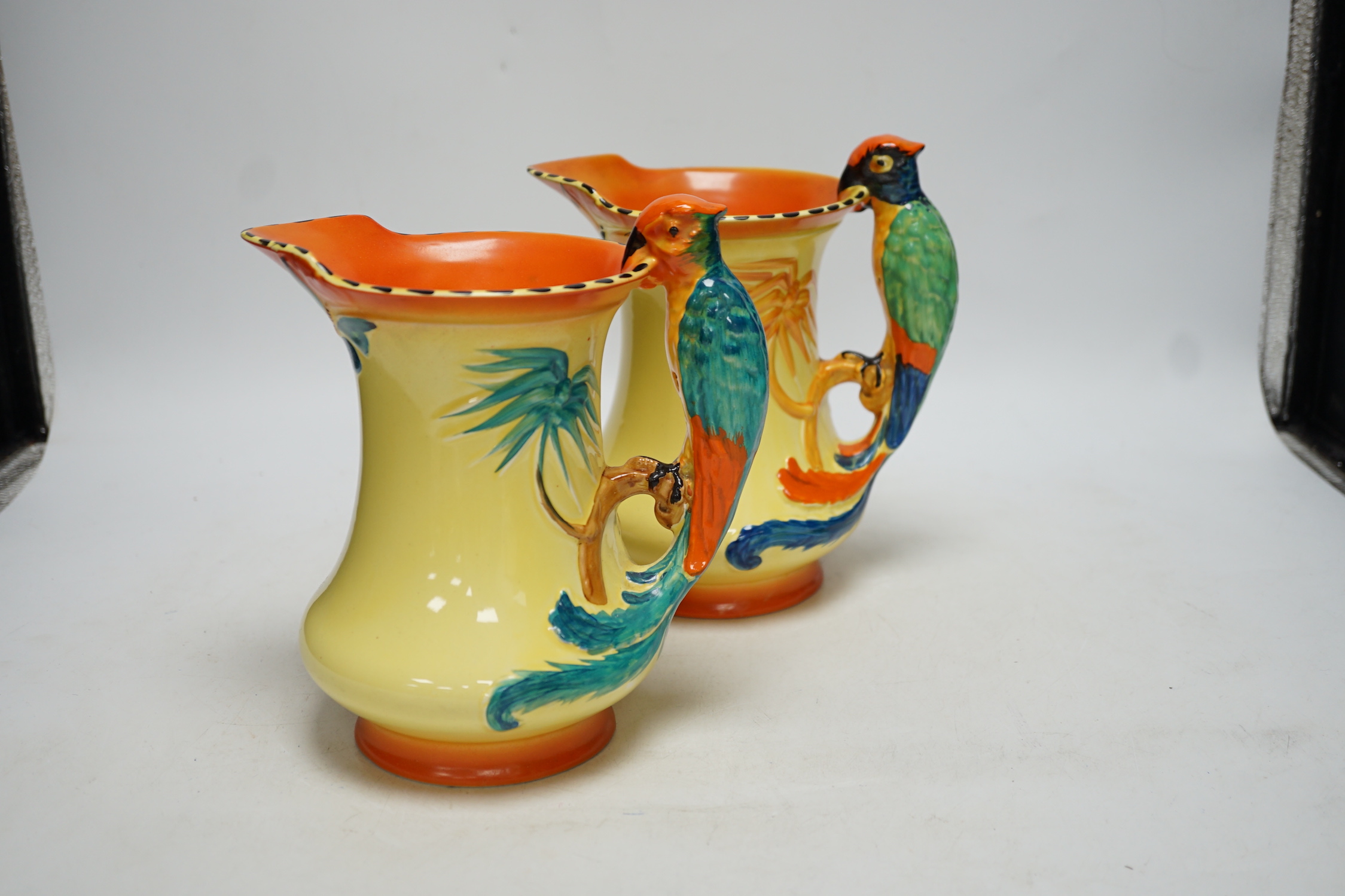 A pair of British Burleigh novelty ‘parakeet’ jugs, 20cm